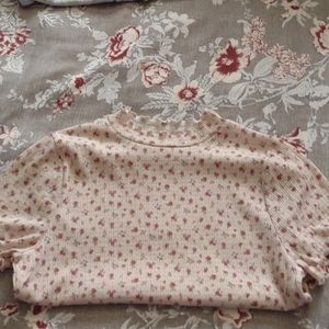 Light beige pink color with floral design